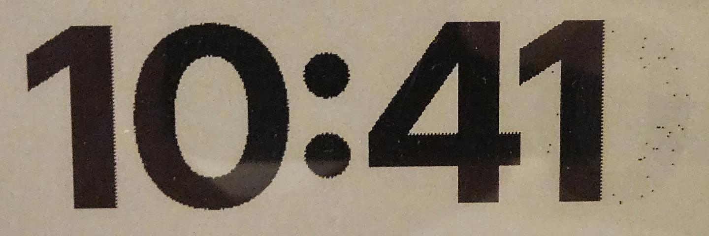 a rather clear 10:41 with some extra black pixels in the last character